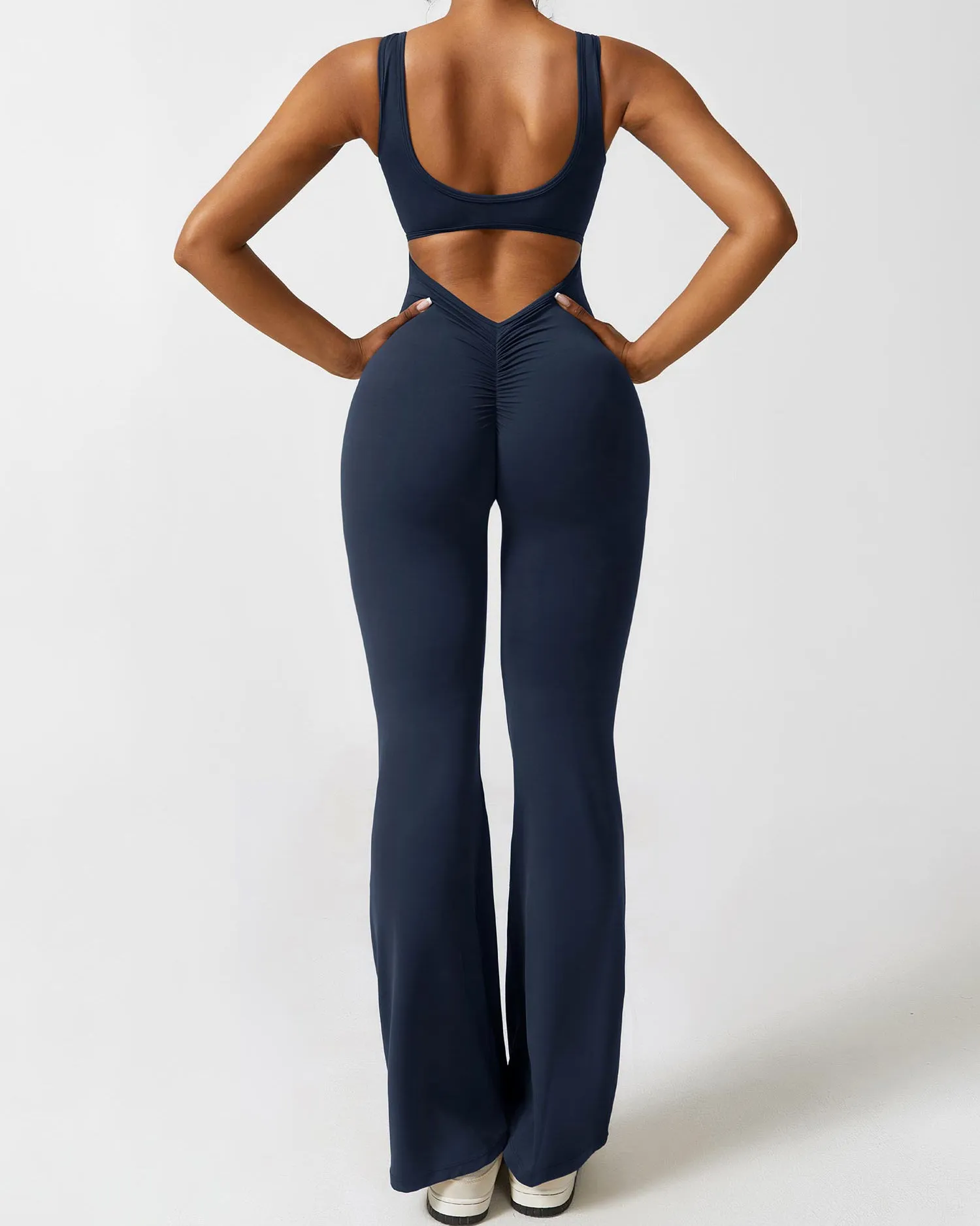 V-Rücken Flared Jumpsuit