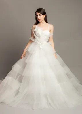 White wedding dress with asymmetrical 3D flower bustier top and puffy layered skirt